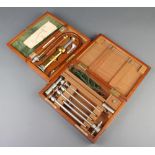 An Arnold and Sons Simplex "enema" boxed, and 1 other medical instrument by Genito-Urinary