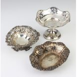 A Victorian repousse and pierced silver heart shaped dish, London 1894, an oval ditto and a tazza,