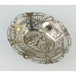 A Continental 800 standard oval repousse pierced dish decorated with cherubs 13cm, 66 grams