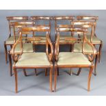 A set of 8 Regency simulated rosewood and inlaid brass bar back dining chairs with plain mid rails