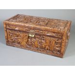 A Chinese carved camphor coffer with hinged lid, 43cm h x 97cm w x 44cm d