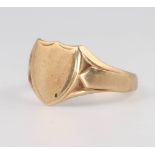 A 9ct yellow gold shield shaped signet ring, 4 grams