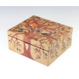 A coloured pressed leather jewellery box decorated with birds amongst trees