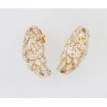 A pair of 9ct yellow gold diamond earrings 4.9 grams