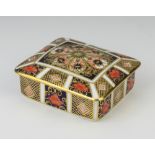 A Royal Crown Derby Imari pattern rectangular box and cover 1128 in original box 11cm