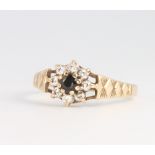 A 9ct yellow gold paste set ring, size N