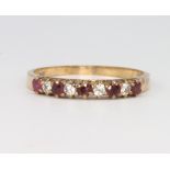 A 9ct yellow gold ruby and diamond ring size N, 1.8 grams