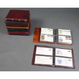A box containing 9 albums of GB first day covers