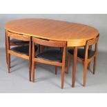 Hans Olsen for Frem Rojle, a mid 20th Century Danish teak "Roundette" dining suite comprising a oval