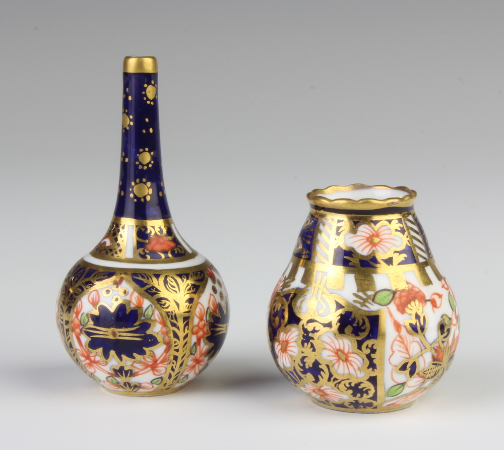 A Royal Crown Derby Imari pattern vase 6cm, a baluster ditto 3.5cm and a pitcher 5cm The last item