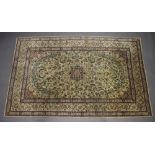 A blue and white ground Nain carpet with central medallion 322cm x 201cm This rug has a strong aroma