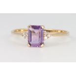 A 9ct yellow gold amethyst and diamond ring size P, 1.4 grams