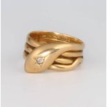 An 18ct yellow gold diamond set snake ring size P, 8.9 grams