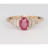A 9ct yellow gold ruby and diamond ring size O 1/2, 2 grams