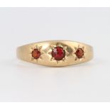 A 9ct yellow gold garnet ring size R, 2.1 grams