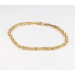 A 9ct yellow gold fancy link bracelet 21cm 3.3 grams