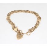 A 9ct yellow gold bracelet set with hearts 9.8 grams