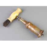 A 19th Century Edward Thomason patent corkscrew with bone handle and brush