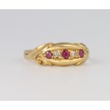 An 18ct yellow gold ruby and diamond ring size L, 2.2 grams