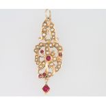 A 14ct yellow gold ruby and pearl pendant 6.1 grams