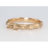 A 9ct yellow gold bamboo effect bangle, 15.3 grams