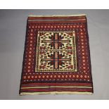 A blue, white and red ground Gulbarjasta rug with central medallion within a multi-row border