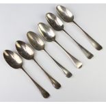 Six Georgian silver table spoons indistinctly marked, 354 grams