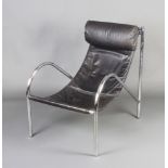 An Eames style mid 20th Century chrome and black leather open arm chair
