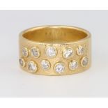 A gentleman's 18ct yellow gold textured 11 stone diamond ring, approx 1.5ct, 28.5 grams, size 4