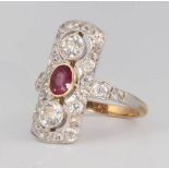 A Victorian style 18ct yellow gold ruby and diamond up finger ring, size O