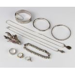A silver bracelet and minor silver jewellery 180 grams