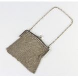 A Victorian silver mesh evening bag London 1873, 106 grams