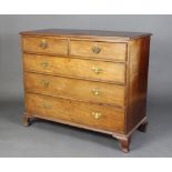 A Georgian mahogany chest of 2 short and 3 long graduated drawers with oak linings and ivory