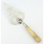 A Victorian silver presentation trowel with ivory handle and presentation inscription, London