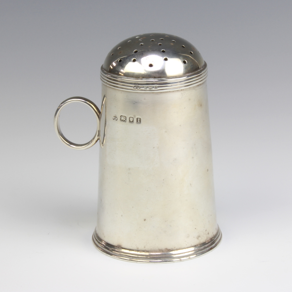 A stylish silver tapered sugar shaker with ring handle, London 1926, maker Wakely and Wheeler, 11cm,