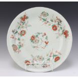 An 18th Century Chinese verte shallow dish decorated with flowers 35cmCracked, stuck and restored