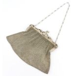 A silver mesh purse with cast mounts, 251 grams