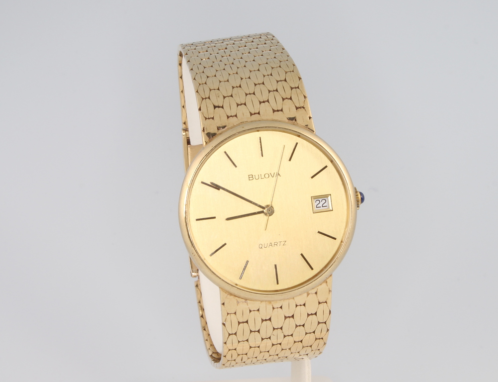 A gentleman's 9ct yellow gold Bulova calendar quartz wristwatch with sapphire winder, gross weight