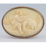 A Victorian carved ivory brooch 55mm x 40mm