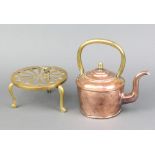 A circular copper kettle with acorn brass finial and handle 12cm x 11cm together with a circular