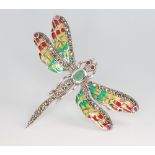 A silver emerald, marcasite and ruby set dragonfly brooch