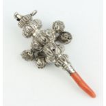 A Victorian cast silver whistle rattle with coral teether, London 1886, 10cm