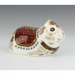 A Royal Crown Derby Imari pattern paperweight of a guinea pig, gold stopper 7cm