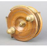 A Gamage 19th Century brass and mahogany centre pin fishing reel 12cm Crack to the wooden top