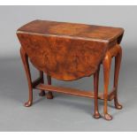 A Queen Anne style figured walnut gate leg drop flap occasional table, raised on cabriole supports