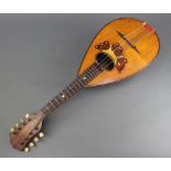 Stridente, an 8 stringed mandolin, labelled Stridente Fabrica di Mandolini Via Antonio 22 Napoli