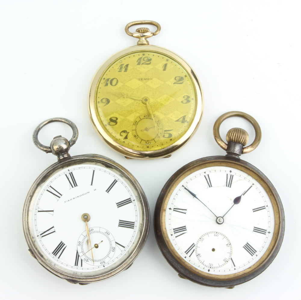 A silver cased keywind pocket watch, a mechanical ditto and a gilt dress watch None of the watches