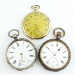 A silver cased keywind pocket watch, a mechanical ditto and a gilt dress watch None of the watches