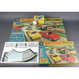 A Lesney Matchbox motorway M2 together with ditto motorway extension E2 and a UK 1 ten volt power