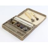 A carved mother of pearl and silver desk seal, a bone ditto in a fitted box